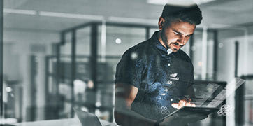 A man using a tablet device